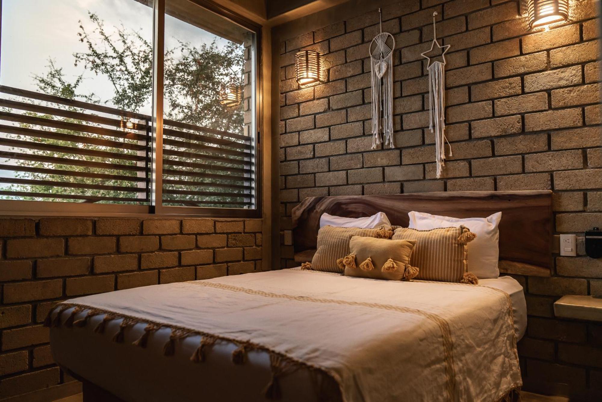 Villa Macarena Apartamentos Boutique - Adults Only بويرتو إسكونديدو الغرفة الصورة